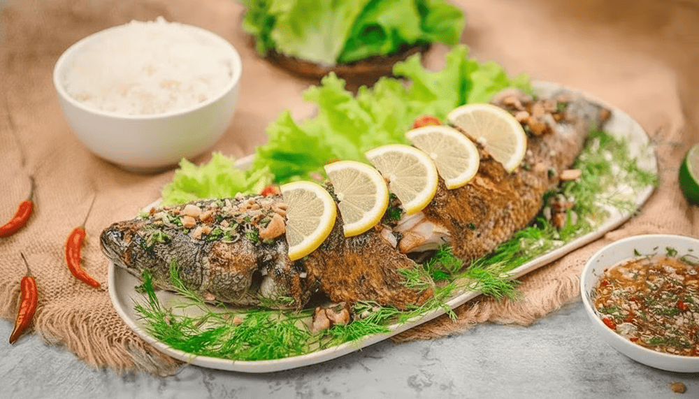 Fresh snakehead fish is grilled over hot coals, retaining its natural sweetness and rich aroma